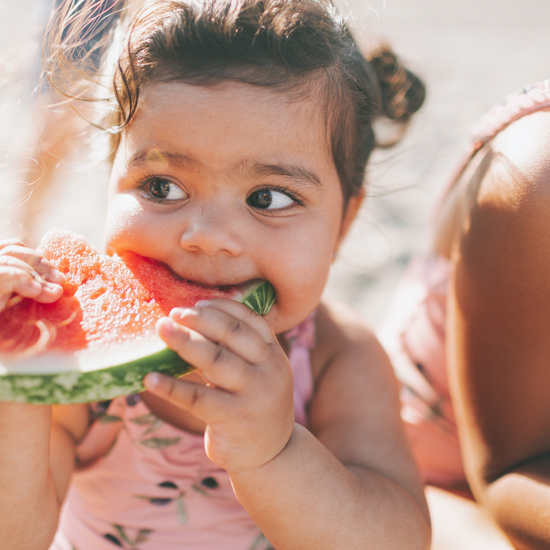 kid eating watermelon